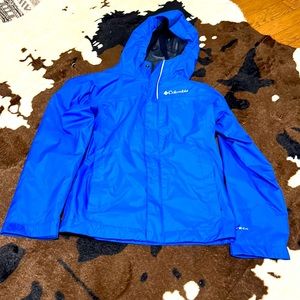 Boys Columbia Rain coat size S, royal blue with black lining.